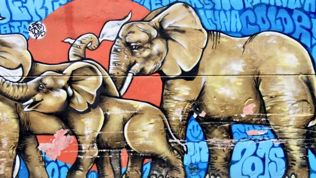 Un graffiti représentant le drapeau blanc brandi par les habitants de Medellin