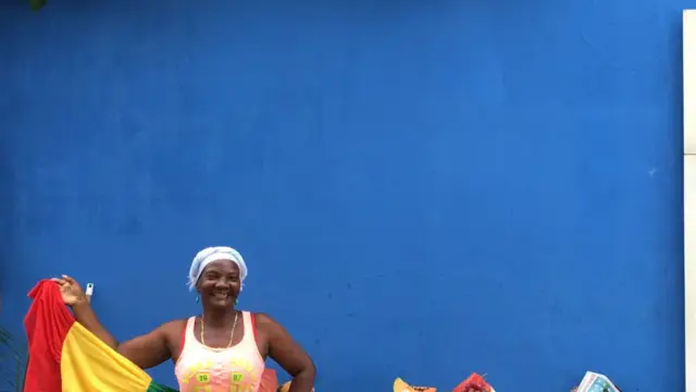Vendeuse de fruits en Colombie